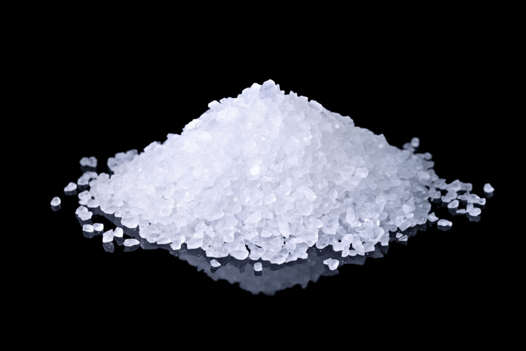 Close-up of a small pile of salt, highlighting sodium as a key element in next-generation battery technology